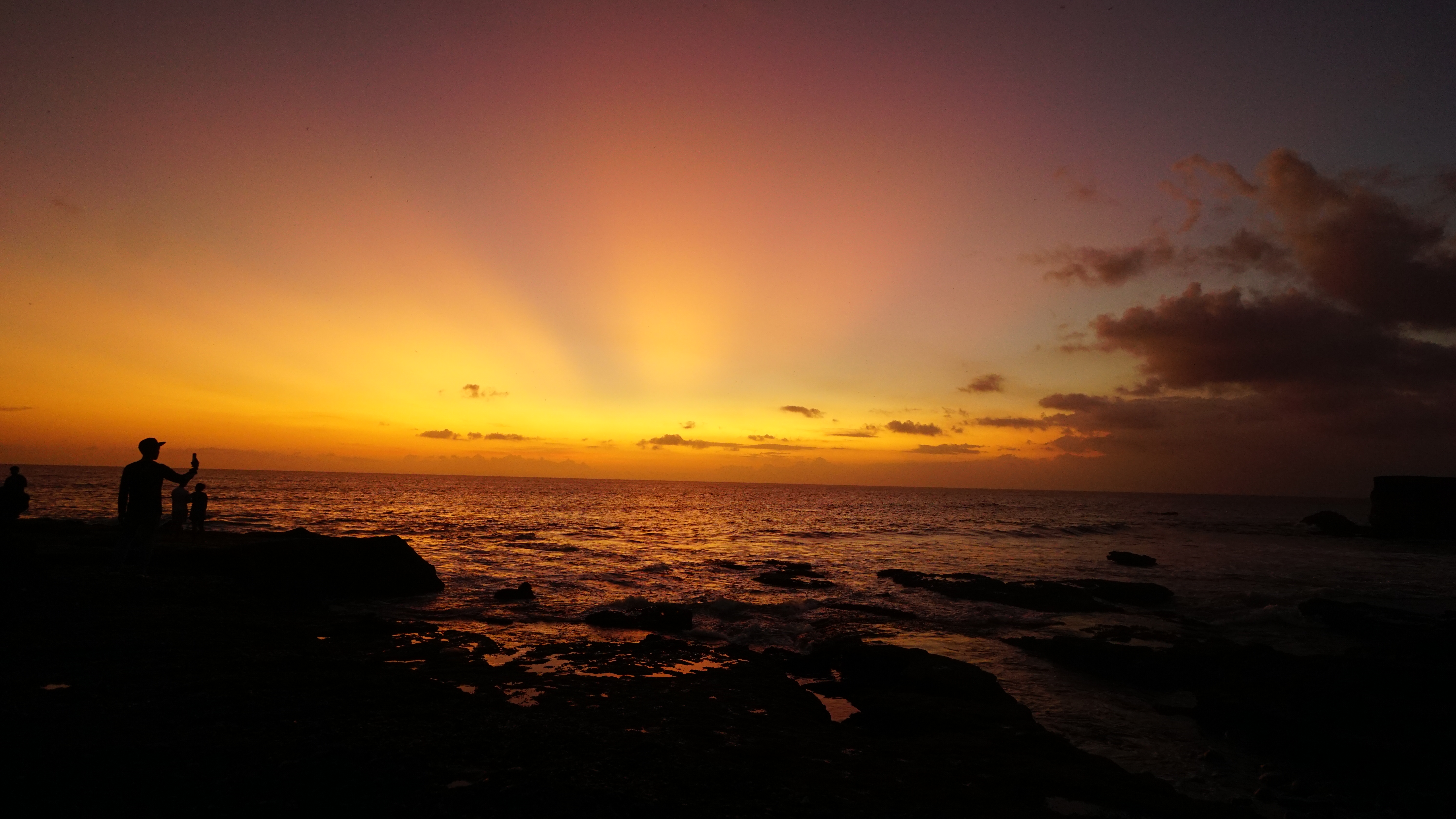 nice sunset in tanah lot temple